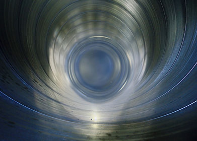 Inside view of a dryer vent cleaning van, showcasing the organized setup and equipment.