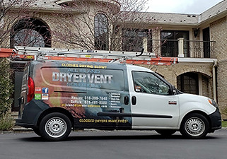Specialized van equipped for dryer vent cleaning services parked outside a residential property.